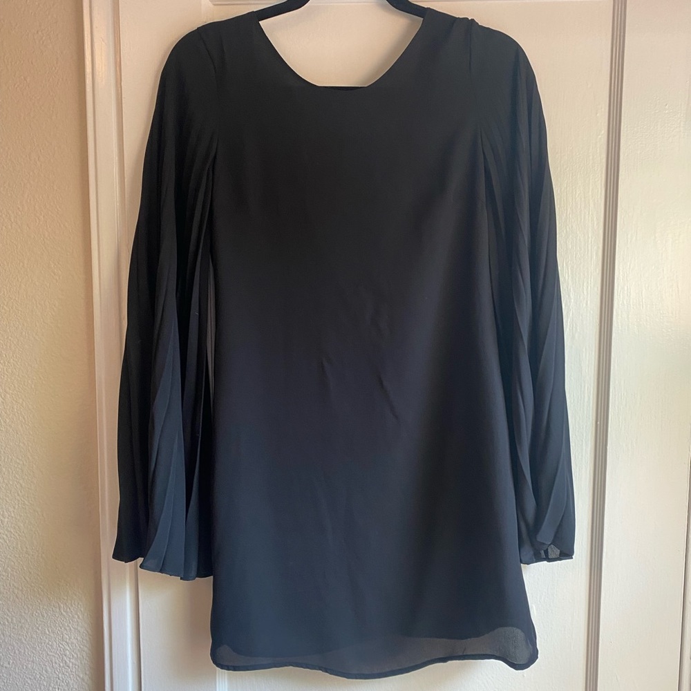 Little black dress with flared sleeves